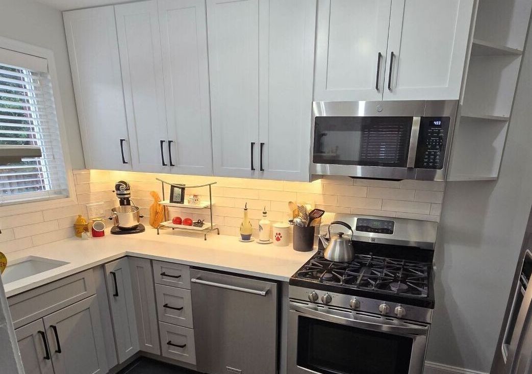 Contemporary Transitional Kitchen Remodel by Everest Home Improvement project photo